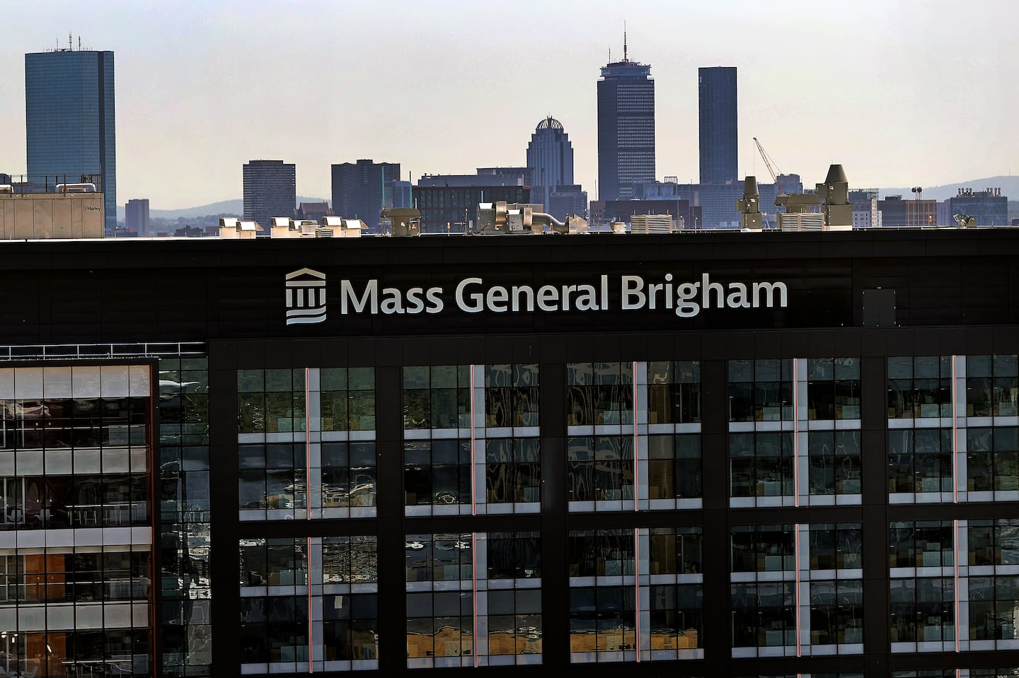 A view of Mass General Brigham's building in Somerville's Assembly Row.