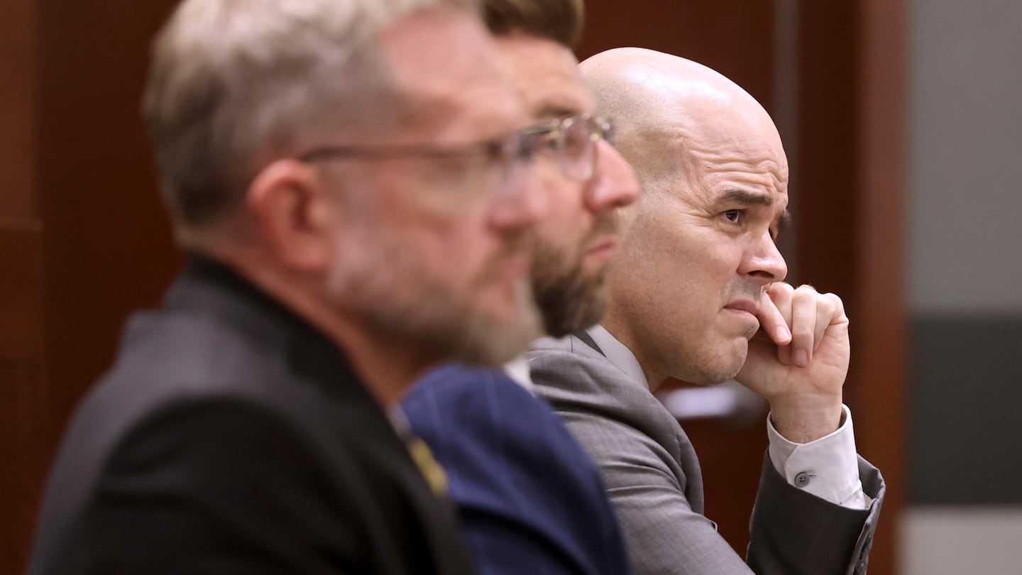 Robert Telles, right, a former Clark County public administrator charged in the murder of Las Vegas Review-Journal investigative journalist Jeff German, listens to closing arguments during his murder trial at the Regional Justice Center in Las Vegas, on Aug. 26.