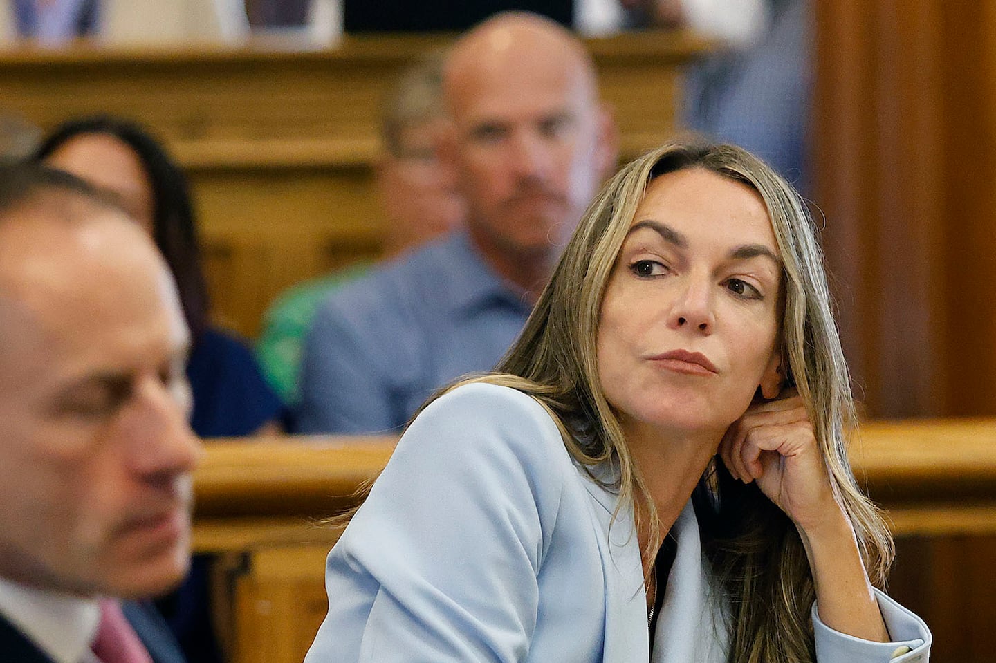 Karen Read listened to Martin Weinberg, one of her attorneys, in Norfolk Superior Court on Aug. 9.