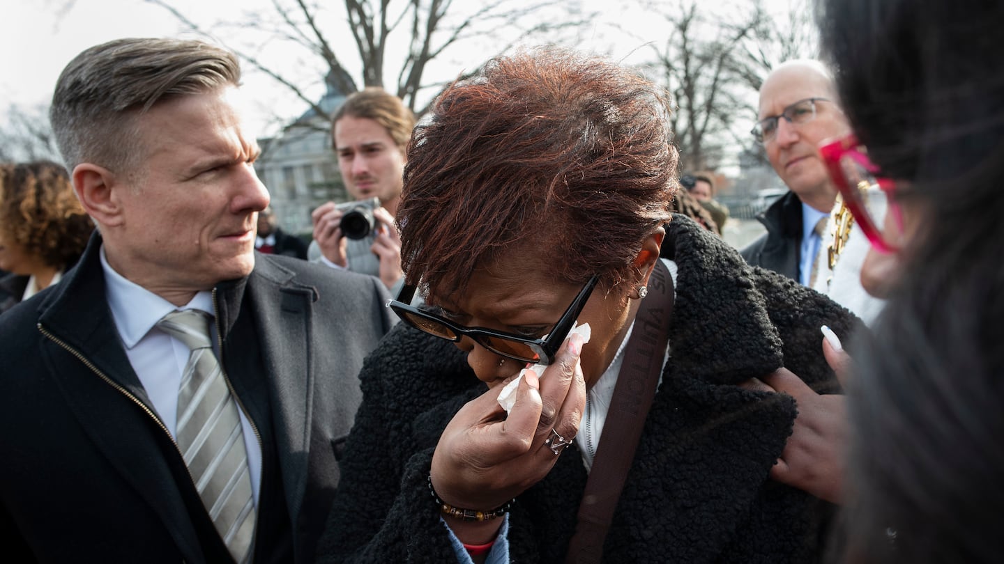 Pamela Walker, mother of Jayland Walker, who was shot and killed by police in Akron, Ohio, is comforted on Capitol Hill in Washington, on Feb. 7, 2023.