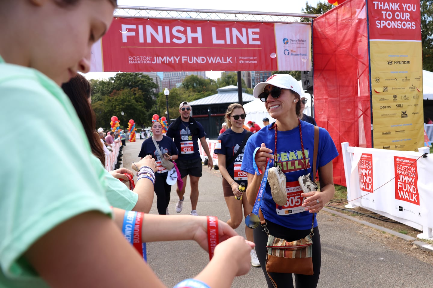 A participant reacted as she crossed the Finish Line on Boston Common for the 39th Annual Jimmy Fund Walk on Oct. 6