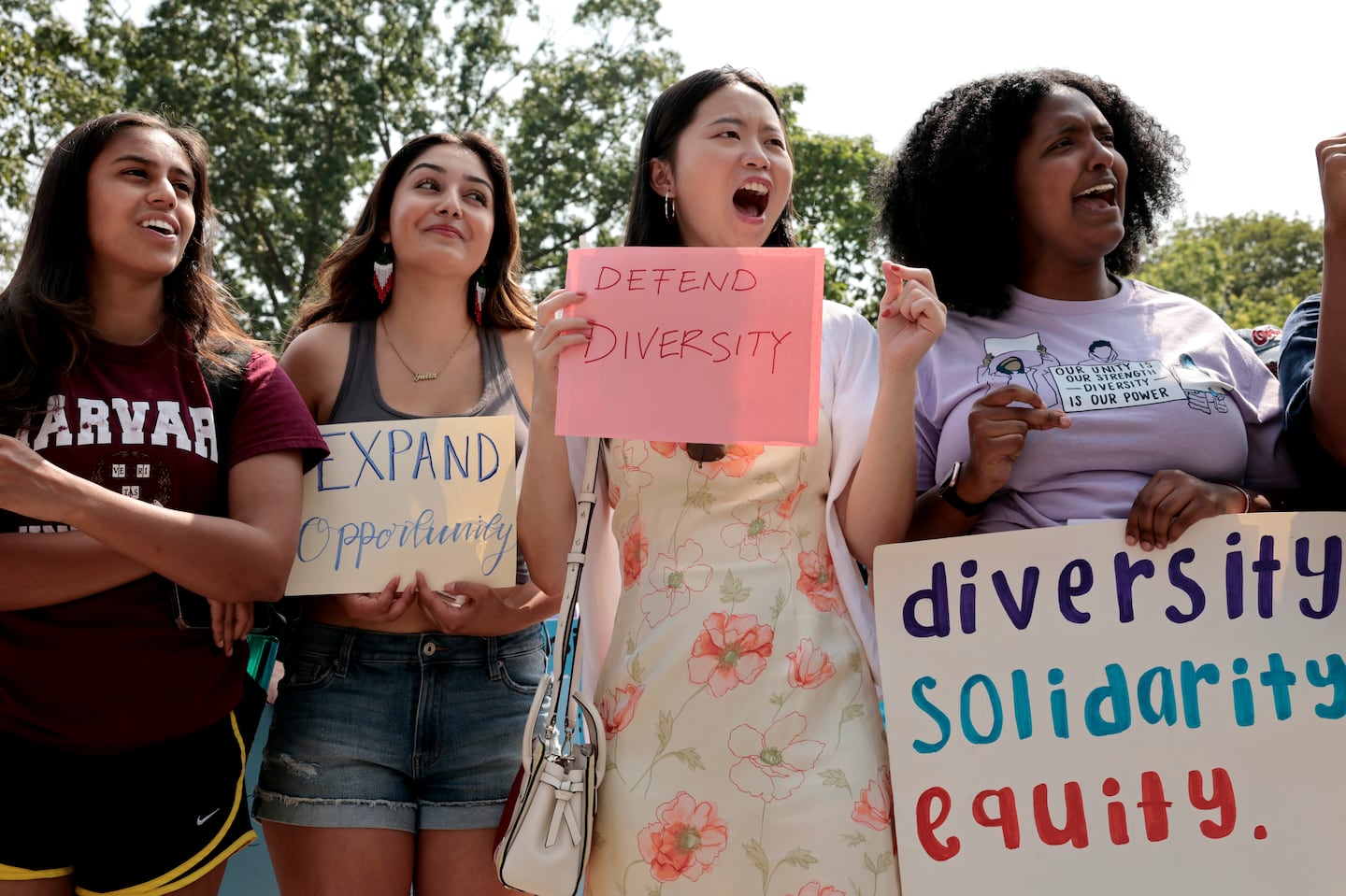 Cambridge, MA - 7/1/2023: (left to right) Harvard seniors Priya Thelapurath, Julia Casas, Tina Chen and Hiren Lami   joined in a rally protesting the Supreme Courts ruling against affirmative action in Cambridge, MA on July 01, 2023. The event was organized by the Coalition for a Diverse Harvard. (Craig F. Walker/Globe Staff)  