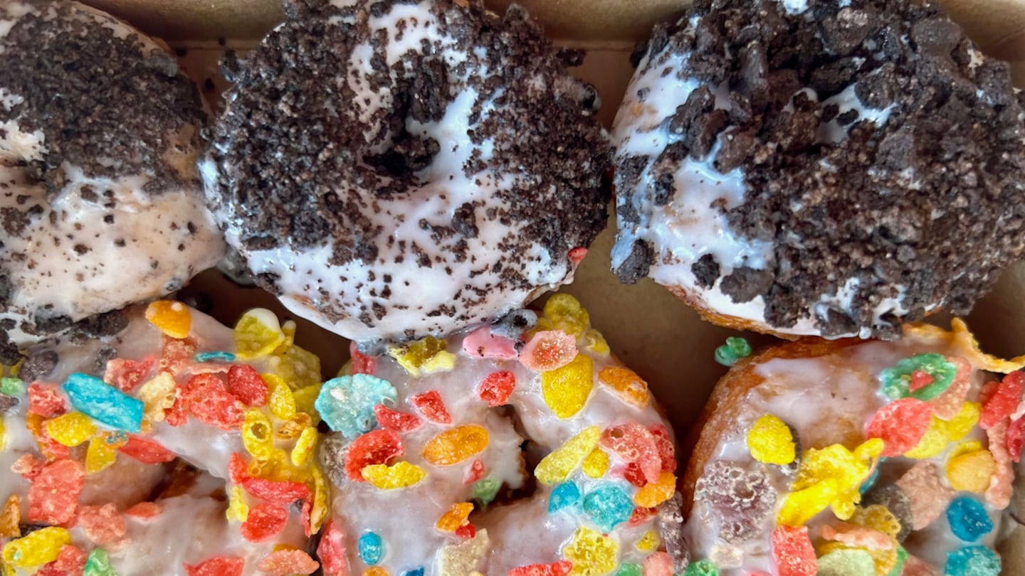 Cookies ’n Cream (top) and Bamm Bamm donuts are among the playful specialty donuts at Eighty8 Donuts in Portland. These are mini-donuts, so you’ll want to sample a few.