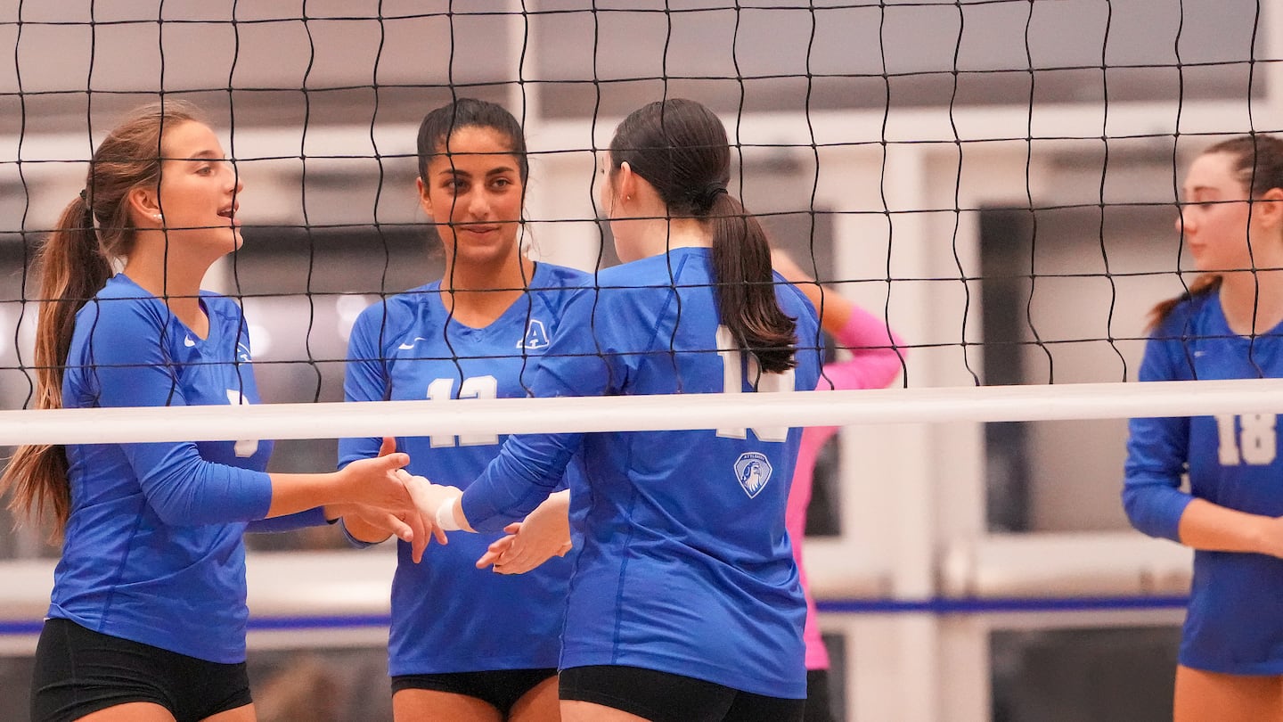 Attleboro's formidable foursome of hitters is led by two sets of sisters: (from left to right) sophomore Olivia Leonardo (No. 8), senior outside hitter Julia Leonardo (No. 12), senior middle hitter Ellie Shelton (No. 19) and her twin sister, senior outside hitter Addison Shelton (No. 18).