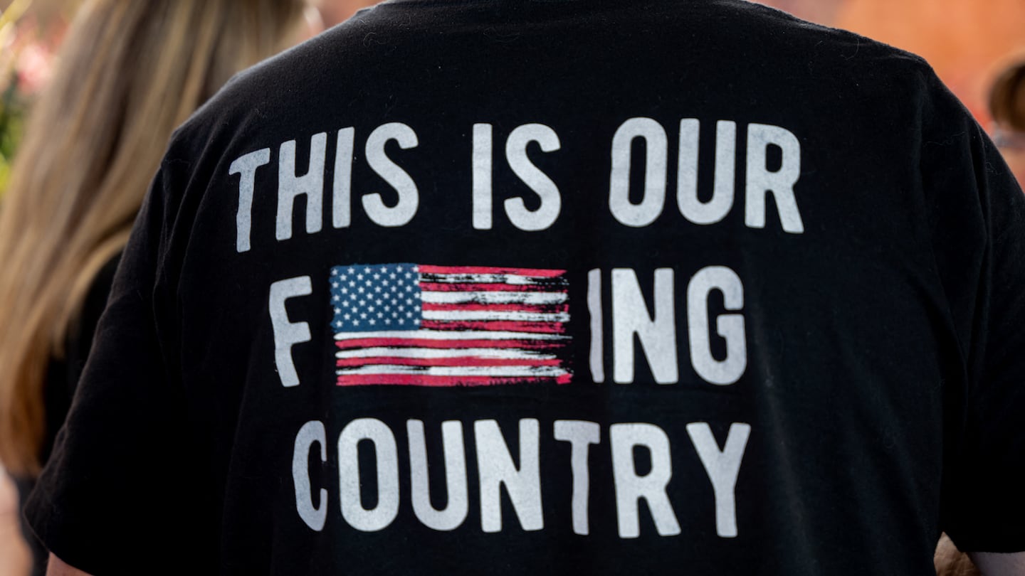 A supporter before attending former president and Republican presidential candidate Donald Trump's campaign rally at Grand Sierra Resort in Reno on Oct. 11.