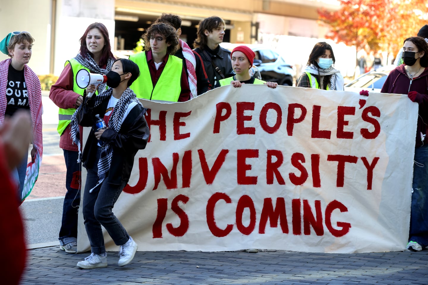 On Friday, student activists and others protested Brown University's decision to reject divestment from companies with ties to Israel. More than 200 protestors held signs and shouted in an effort to call attention to the Corporation of Brown University's vote on Oct. 8.