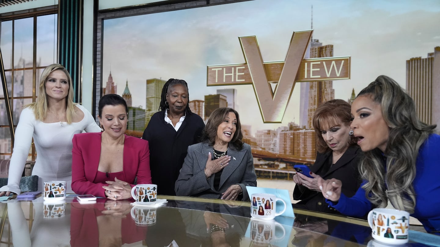 Democratic presidential nominee Vice President Kamala Harris chats with the hosts during a commercial break at The View, Tuesday, Oct. 8, 2024, in New York.