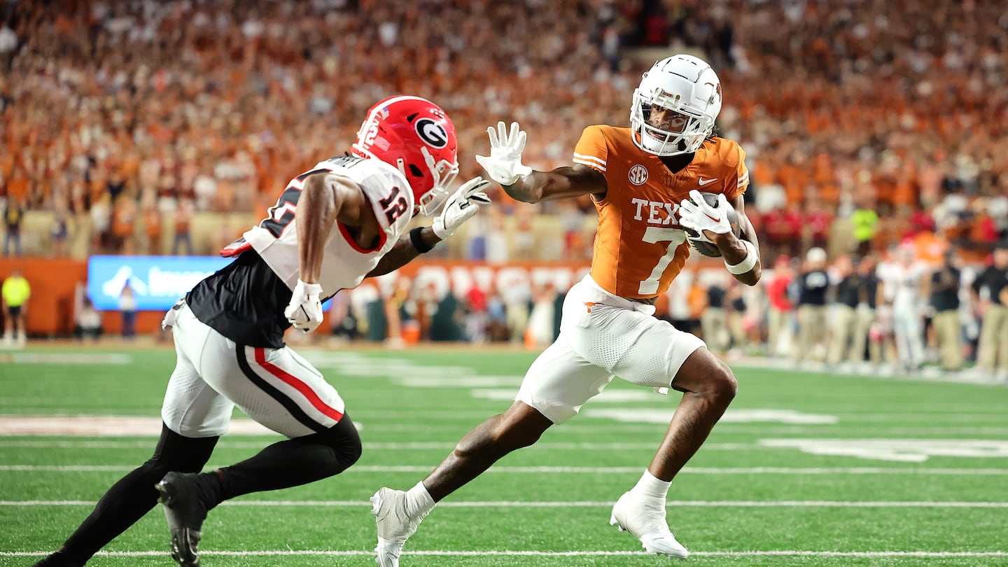 Texas wide receiver Isaiah Bond held of Georgia's Julian Humphrey to score on a 2-yard touchdown catch in the third quarter.