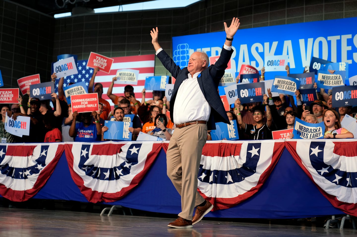 Democratic vice presidential nominee and Minnesota Governor Tim Walz reacted to supporters during a campaign rally Saturday in Nebrask.