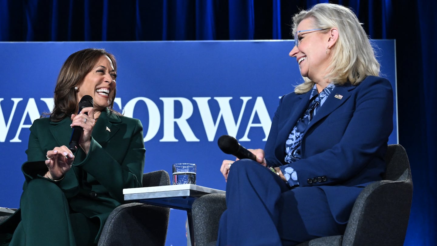 Vice President and Democratic presidential candidate Kamala Harris and former Representative Liz Cheney, Republican of Wyoming, hold a moderated town hall discussion at the Royal Oak Music Theatre in Royal Oak, Mich., on Oct. 21, 2024.