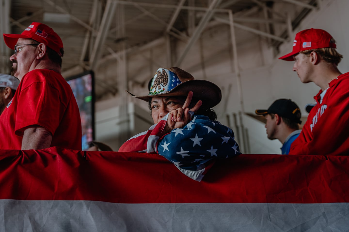 A supporter of Donald Trump wore a hat with American and Mexican flag imagery, at his fly-in campaign stop at the Dodge County Airport in Juneau, Wis., on Oct. 6.