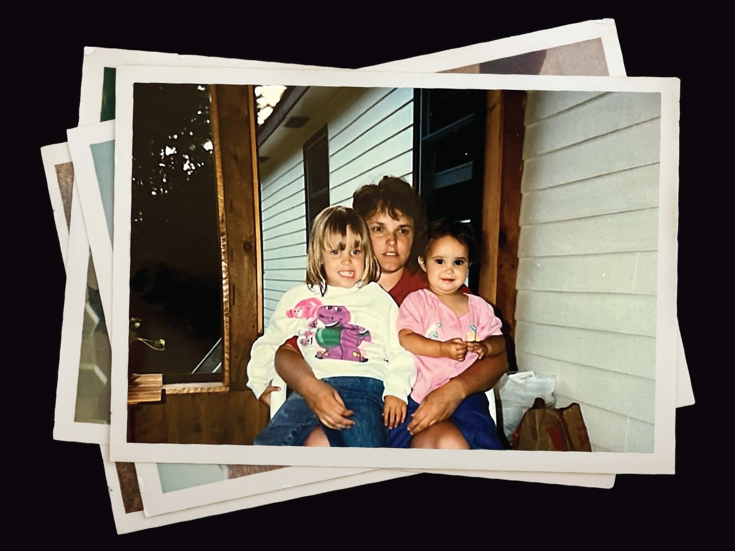 Lee Ann Daigle with her daughters Lauryn (left) and Kristyn (right) at their home in Litchfield, New Hampshire, in an undated photo.