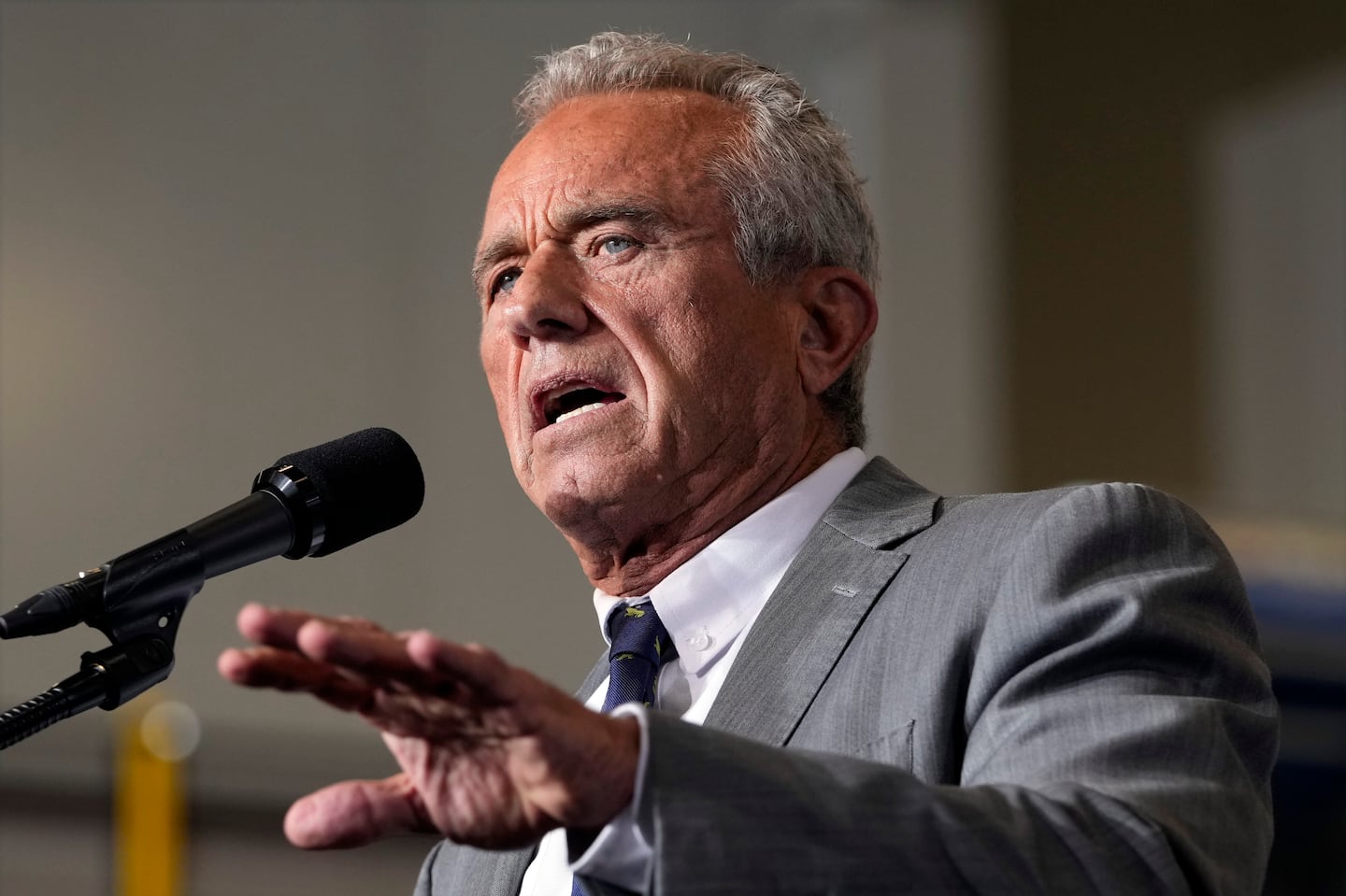 Robert F. Kennedy, Jr., speaks before Republican presidential nominee former President Donald Trump at a campaign event, Friday, Sept. 27, 2024 in Walker, Mich.