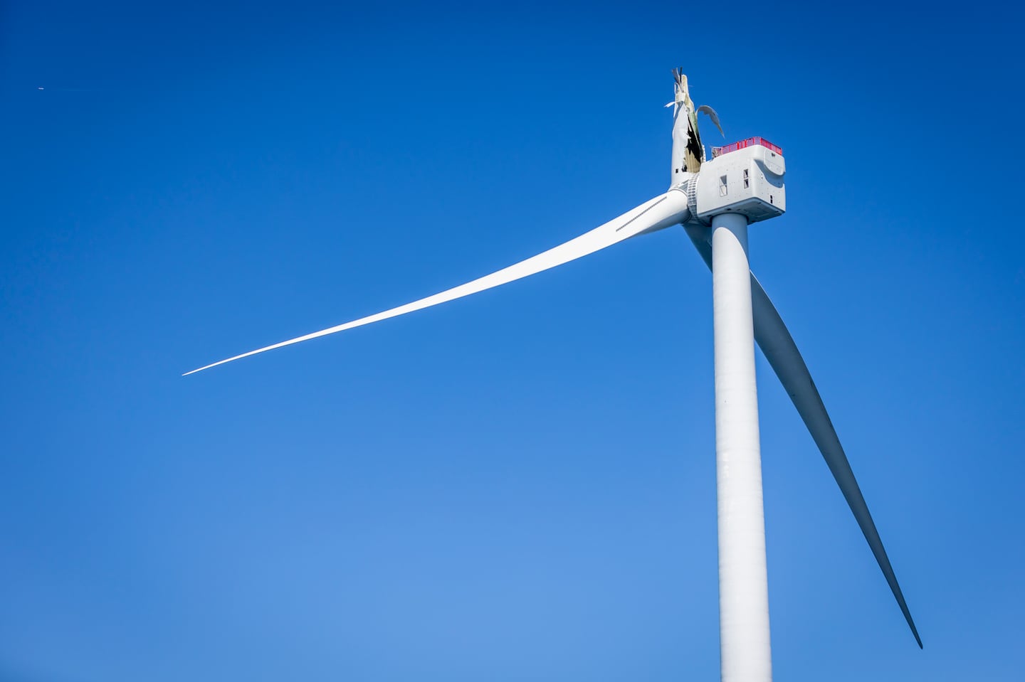 A wind turbine with a broken blade at Vineyard Wind 1, a wind farm off the coast of Massachusetts, photographed Sept. 10.