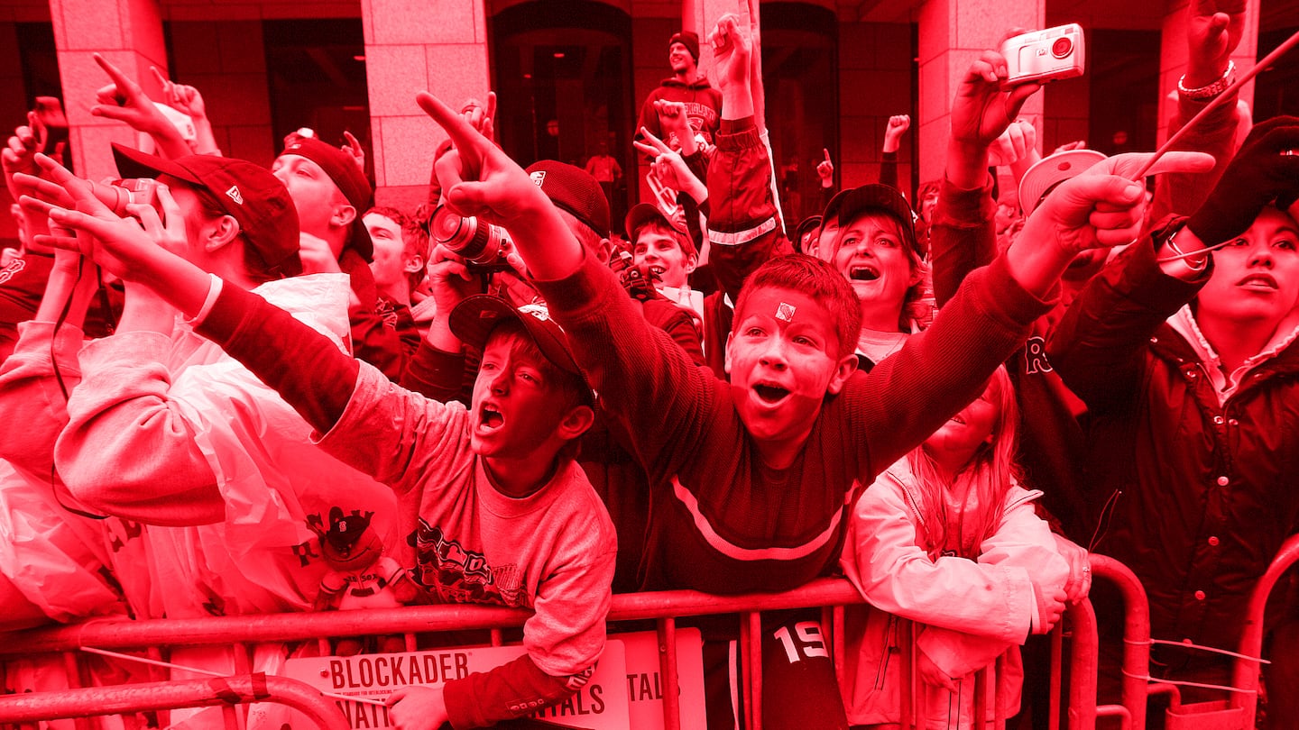 Eight-year-old Colin Jones and 10-year-old Walter Hannon were right in front at the Red Sox' rolling rally on Oct. 30, 2004.