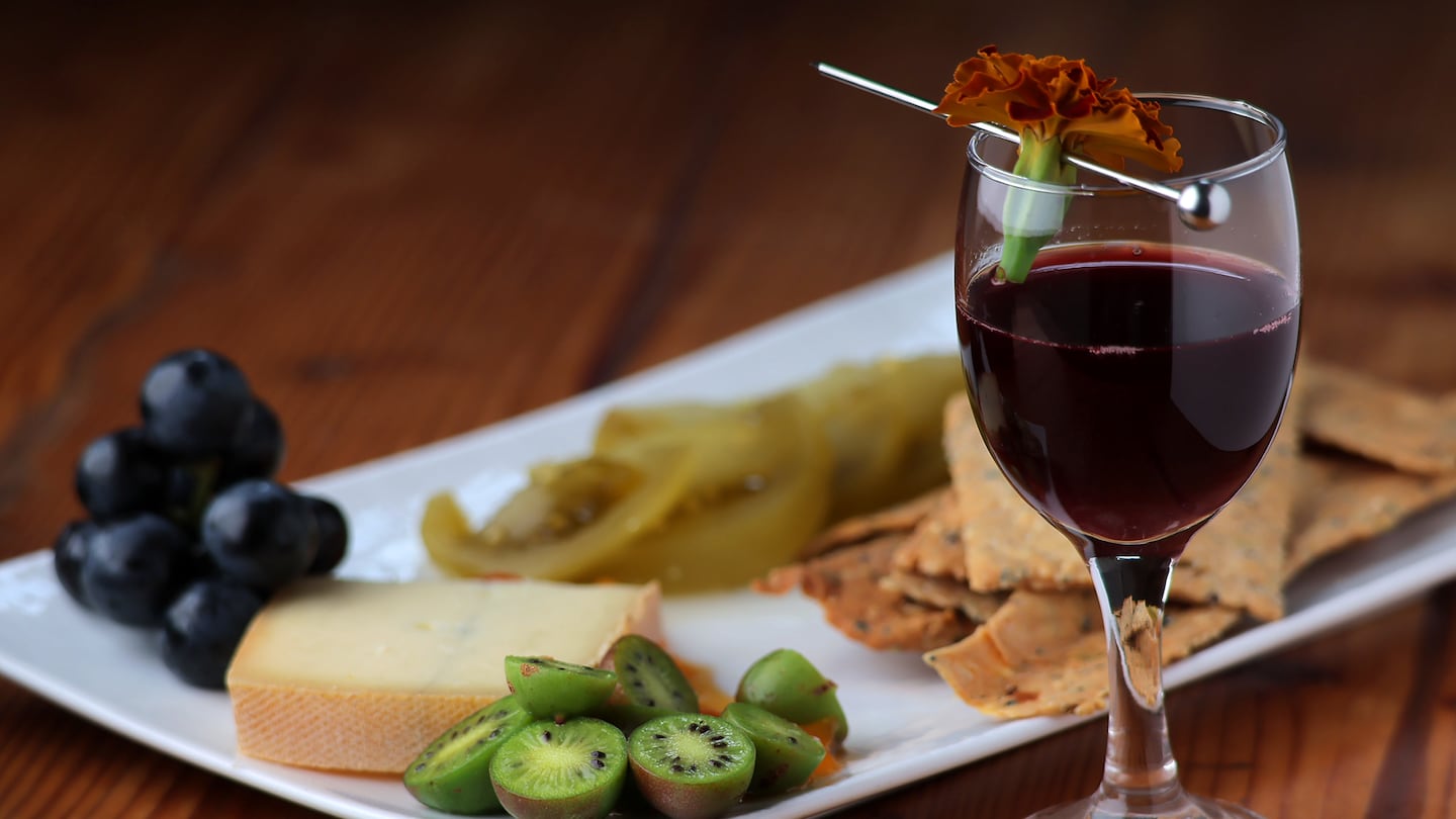 At Forage in Cambridge, diners can order nonalcoholic beverage pairings to accompany the restaurant's tasting menus. Here, a cheese plate is paired with an alcohol-free cocktail made with sour cherry, vinegar, and cinnamon.