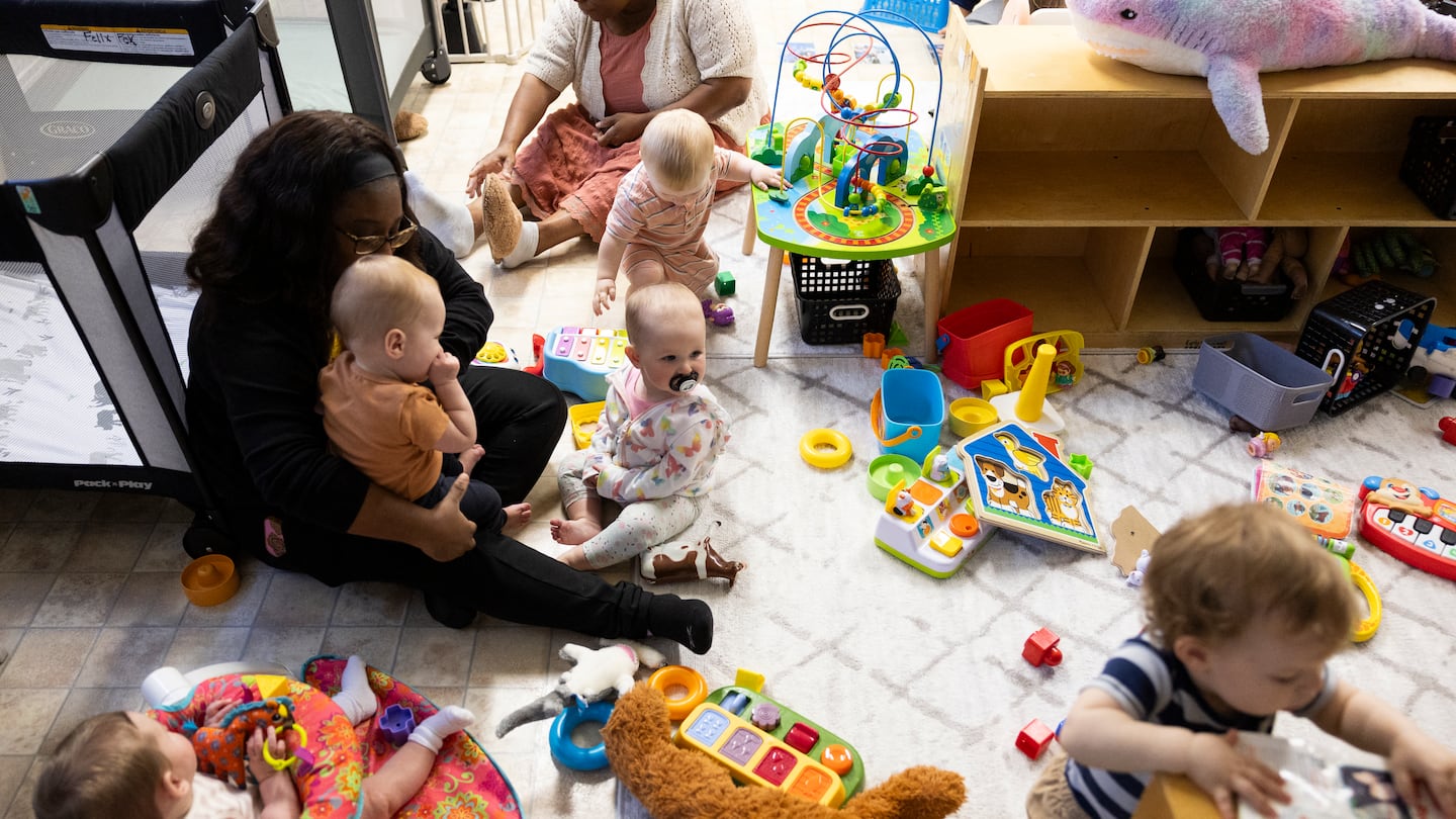 Children were cared for by teachers' aides at Sonshine Christian Academy in Drexel Hill, Pa., on Sept., 11. Vice President Kamala Harris, the Democratic nominee for president, has vowed to make permanent a child tax credit. Republican Donald Trump's running mate, JD Vance, said families should rely more heavily on relatives to care for young children.