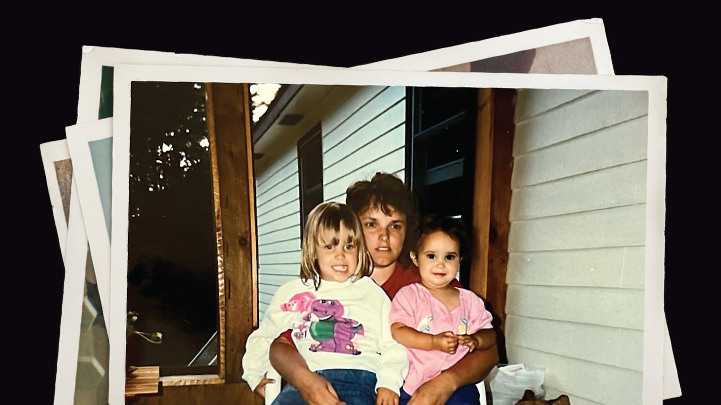 Lee Ann Daigle with her daughters Lauryn (left) and Kristyn (right) at their home in Litchfield, New Hampshire, in an undated photo.