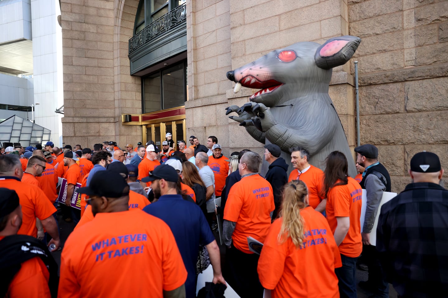 Commuter rail workers at Keolis Commuter Services, which operates the commuter rail system on behalf of the MBTA, held a rally Wednesday for pay raises in their new labor contract in front of South Station with their union, the International Association of Machinists and Aerospace Workers Local 318.