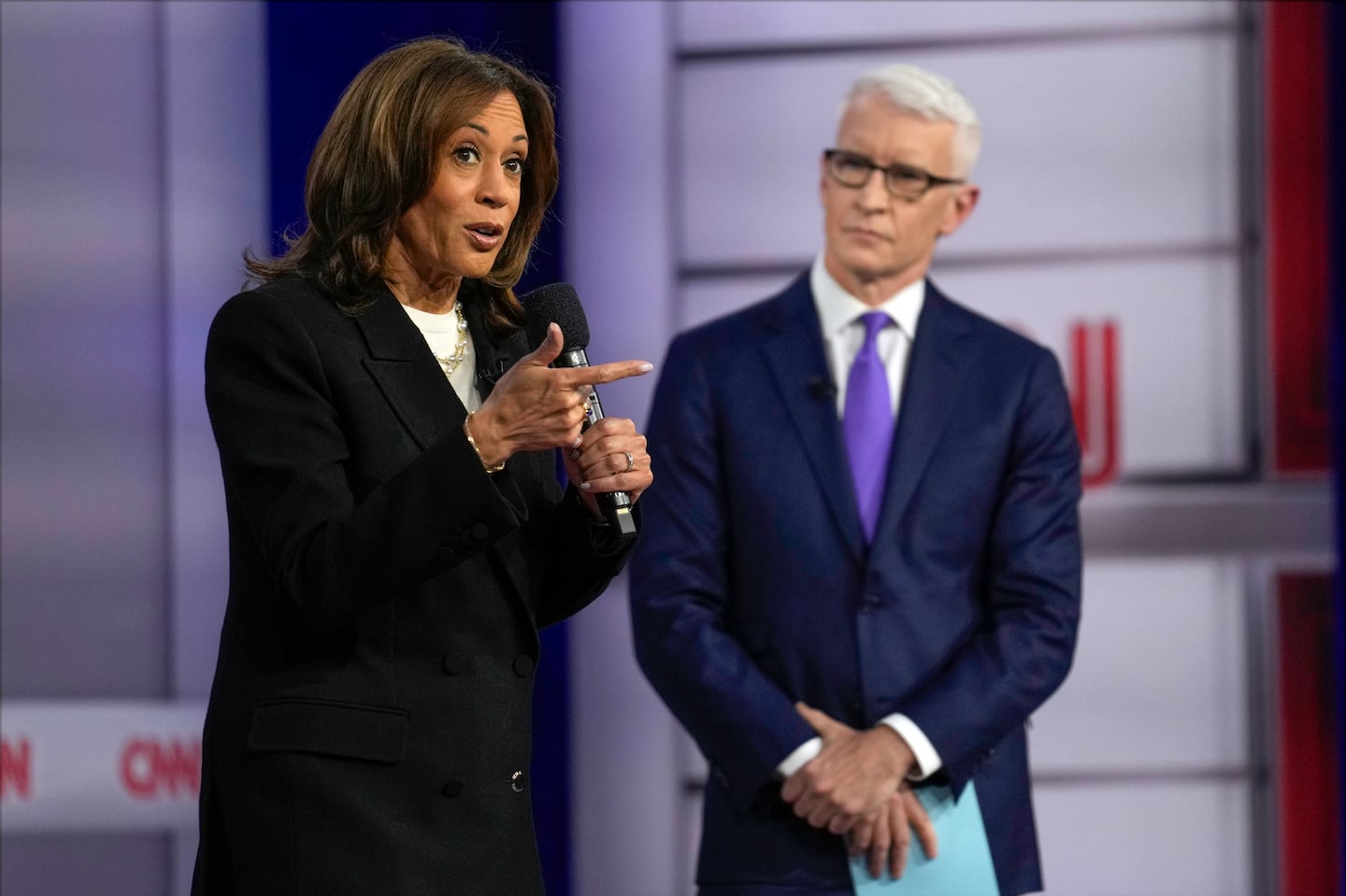 Vice President Kamala Harris speaks during a CNN town hall in Aston, Pa., Oct. 23, as moderator Anderson Cooper listens.