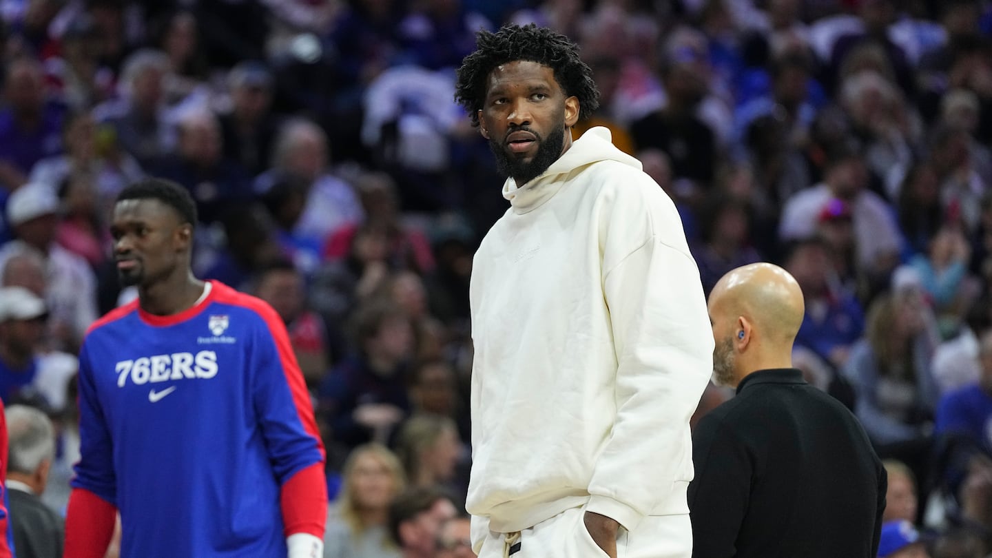 76ers All-Star center Joel Embiid was just a spectator for Philadelphia's season opener against the Milwaukee Bucks Wednesday night in Philadelphia.