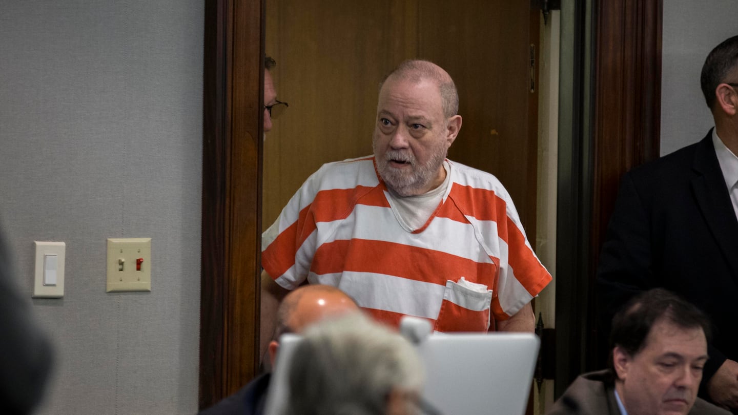 Greg McMichael enters the courtroom before a hearing challenging his conviction of killing Ahmaud Arbery in 2020 on Thursday in Brunswick, Ga.