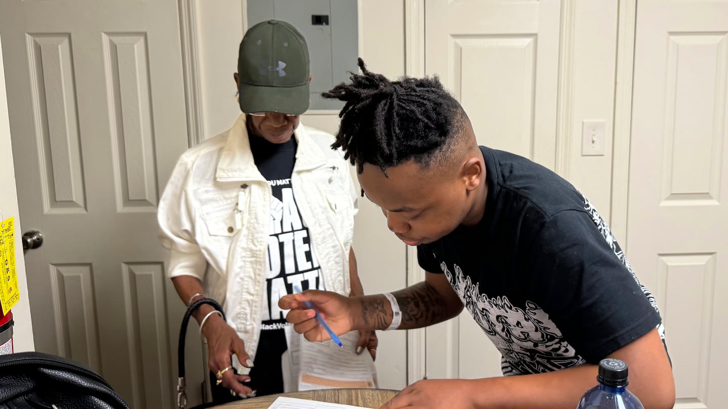 Patricia Powell helped Jaleen Green register to vote in Georgia's Terrell County on Oct. 5.