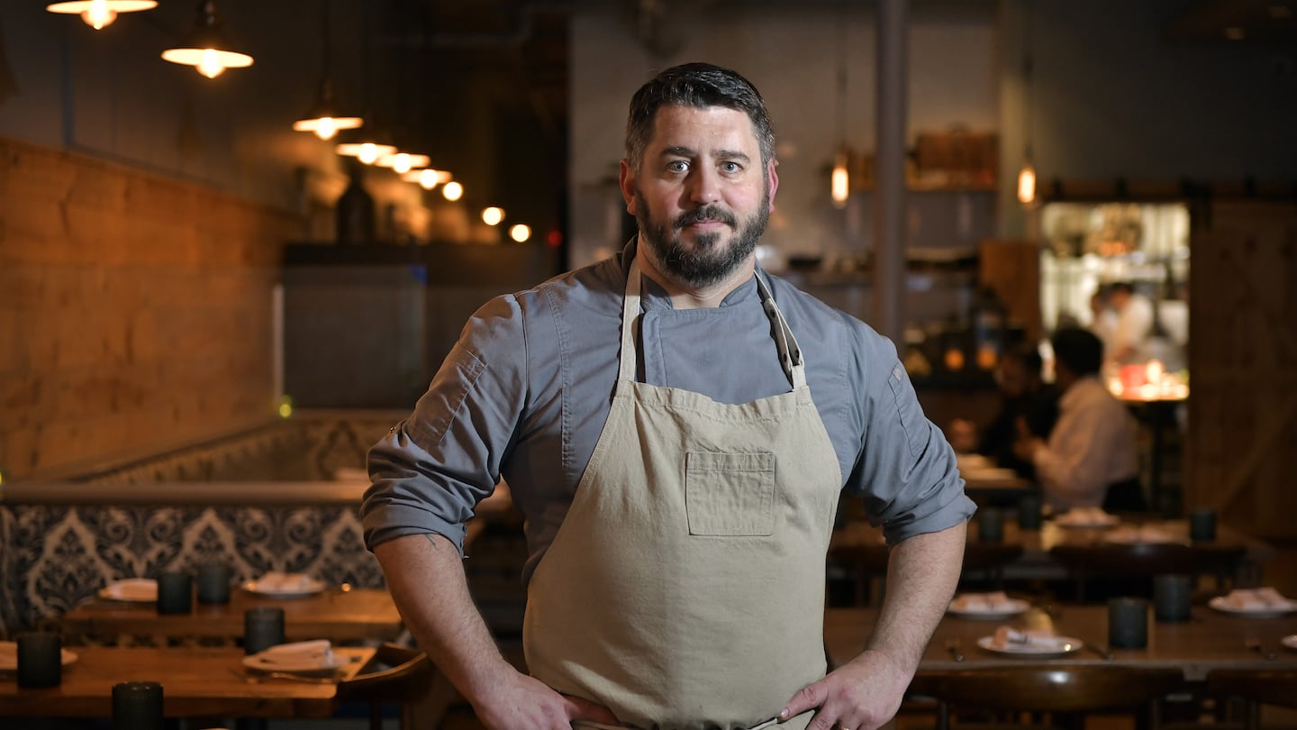 Will Gilson shown in his Cambridge restaurant Puritan Oyster Bar in 2023.