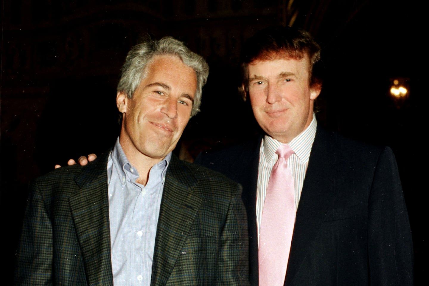 Jeffrey Epstein (left) and Donald Trump posed together at the Mar-a-Lago estate, Palm Beach, Florida in 1997.