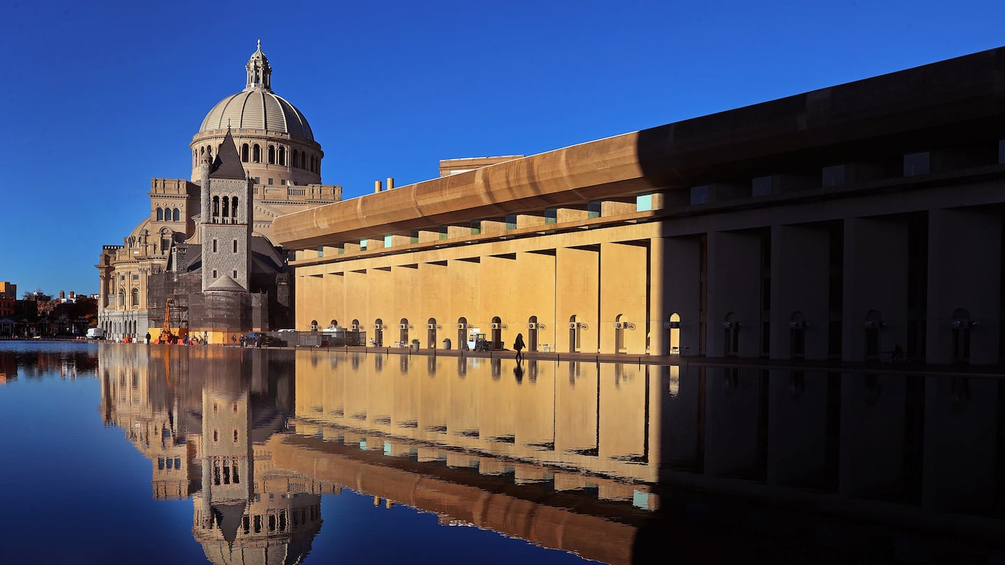 Almost a near perfect reflection on the pool at the Christian Science Plaza in Boston Friday morning.