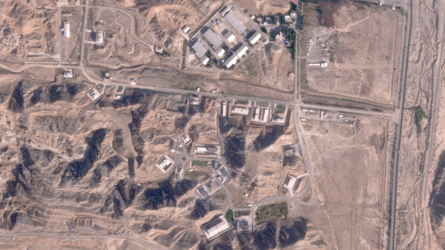 This satellite photo from Planet Labs PBC shows damaged buildings at Iran's Parchin military base outside of Tehran, on Oct. 27.