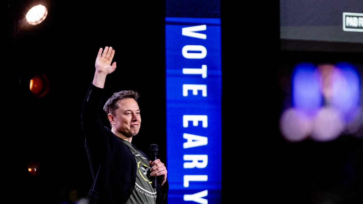 Elon Musk gestures as he speaks at Life Center Church in Harrisburg, Pa., on Oct. 19.