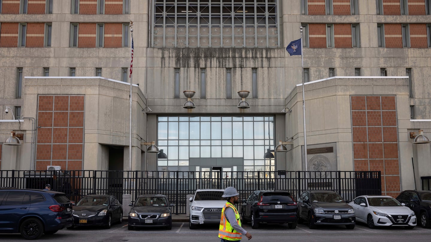 A construction worker walked past the Metropolitan Detention Center in the Sunset Park neighborhood of the Brooklyn borough of New York in September.