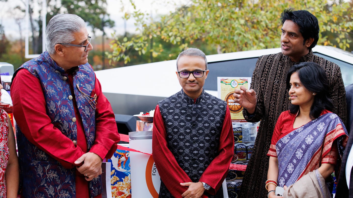 The Foundation of Indian Americans New England president Abhishek Singh (right) addressed a small group.