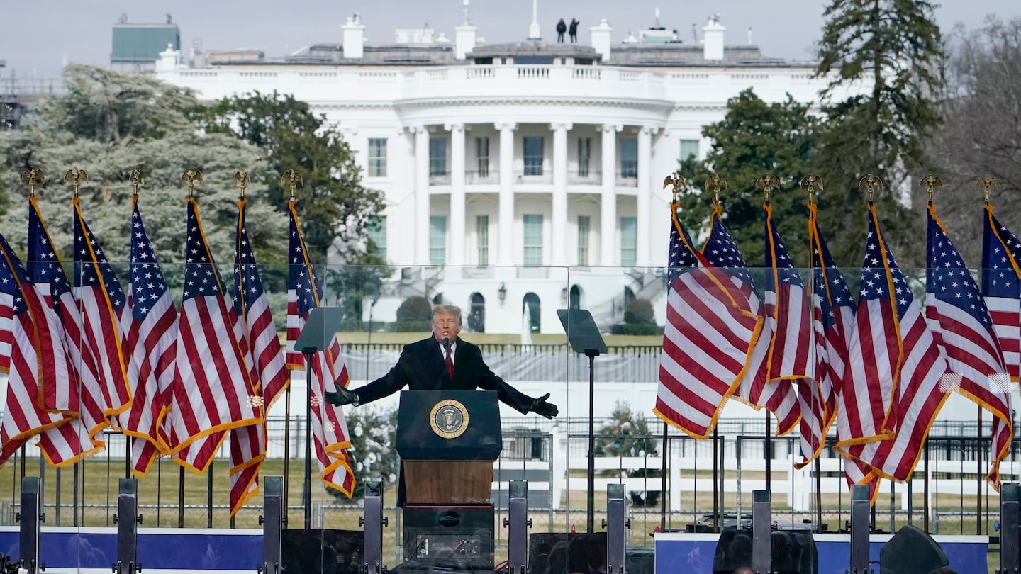 With the White House in the background, former president Donald Trump speaks at a rally in Washington, Jan. 6, 2021.