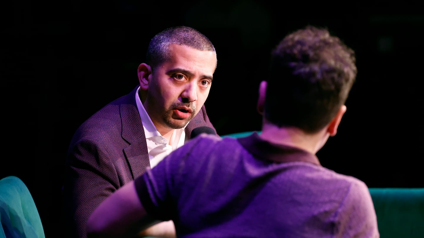 Mehdi Hasan and Jon Lovett speak onstage during the Crooked Media - Lovett or Leave It: Live on Tour, on April 25, 2024 in Washington, DC.