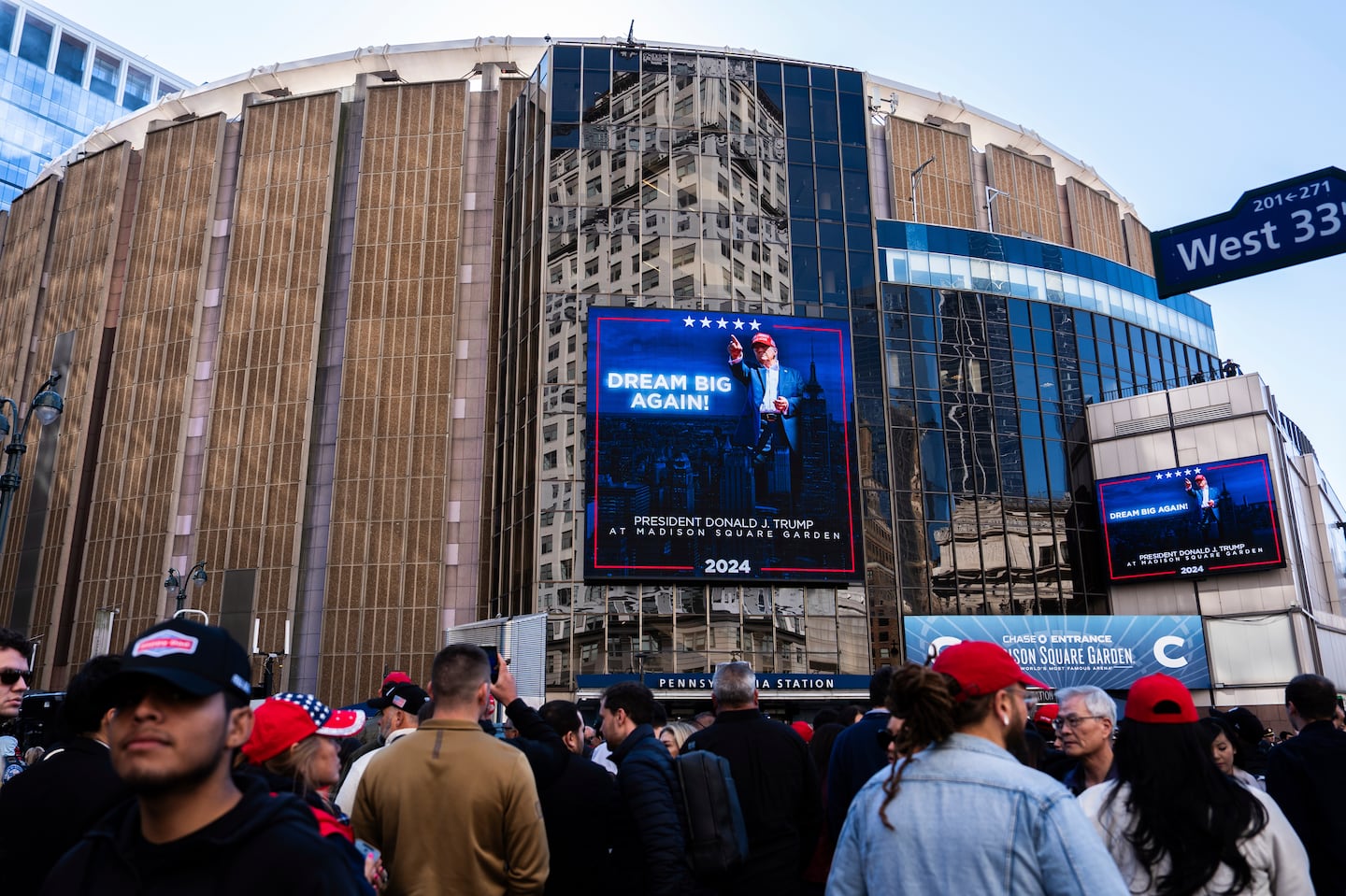 People walked outside Madison Square Garden before a campaign rally for Republican presidential nominee former president Donald Trump, Oct. 27, in New York.