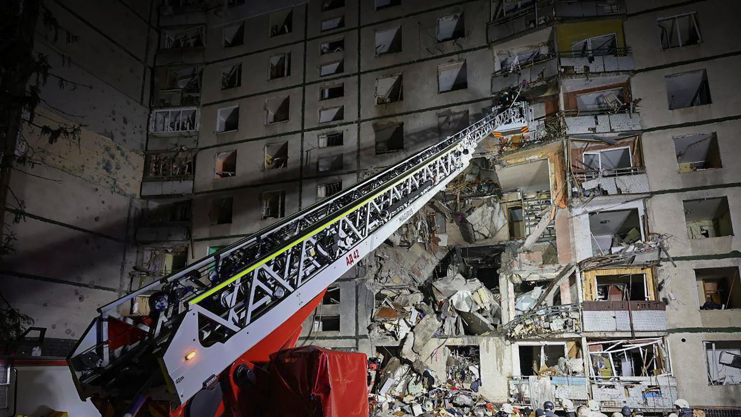 A multi-storey apartment building is seen damaged by a Russian attack in Kharkiv, Ukraine, on Oct. 30.