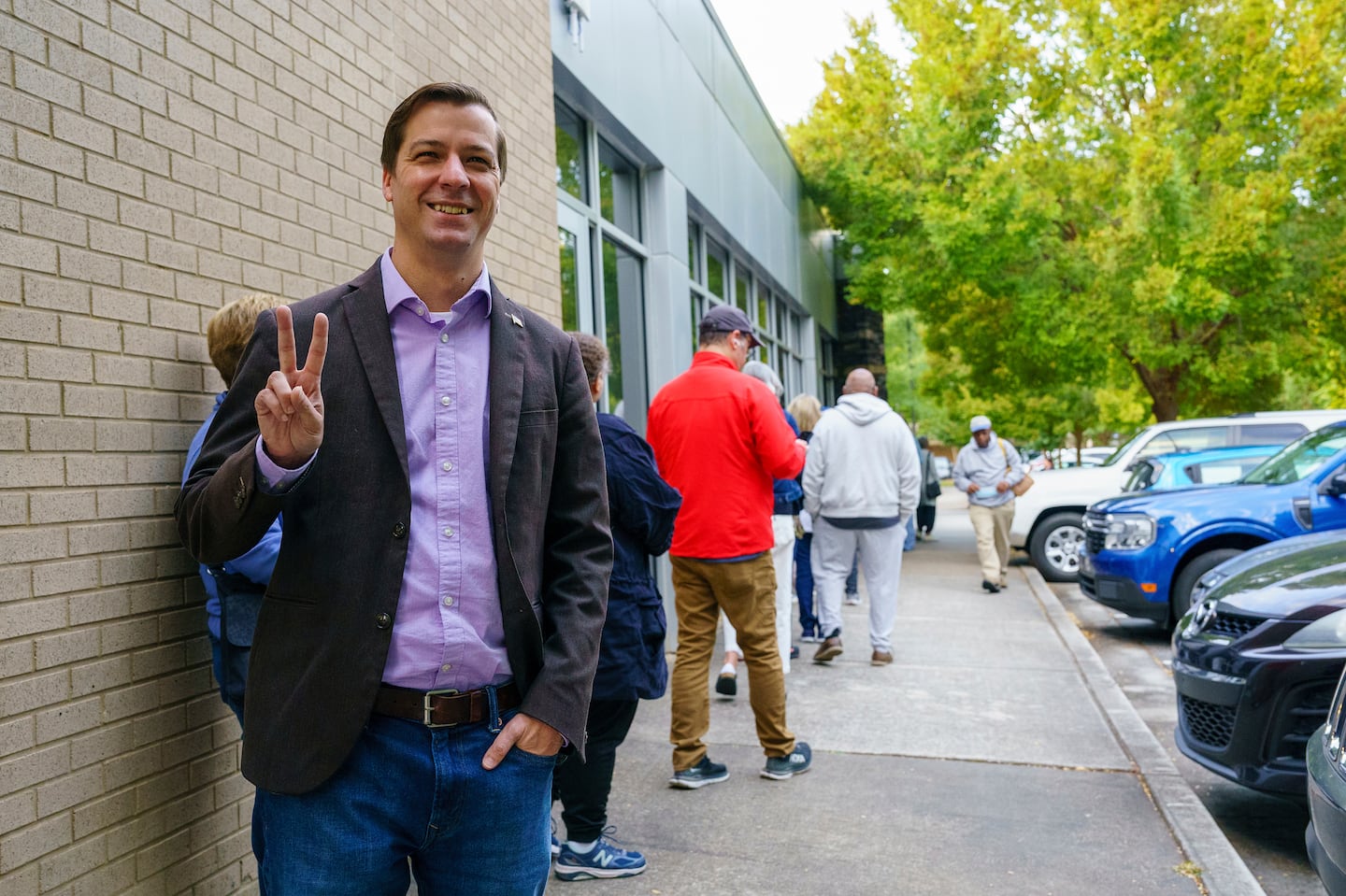 Libertarian presidential candidate Chase Oliver stood in line to vote at the Tucker-Reid H. Cofer branch of the Dekalb County Public Library on the first day of early voting last month in Tucker, Ga.