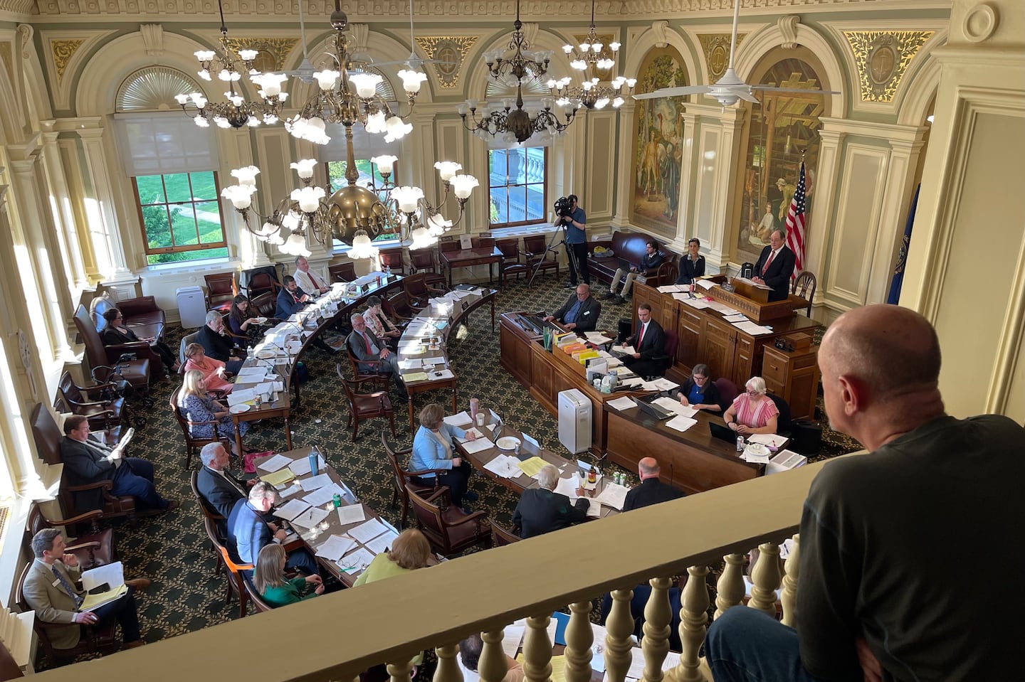 Paul Morrissette, a partner with East Coast Cannabis in Maine, watches from the gallery as the New Hampshire Senate discusses a bill Thursday, May 16, 2024, to legalize marijuana for recreational use.