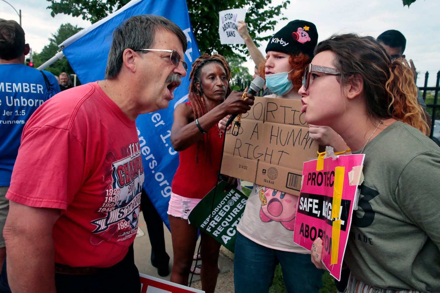 Steve Sallwasser, of Arnold, debated Brittany Nickens, of Maplewood, during competing rallies outside Planned Parenthood of Missouri in St. Louis, following the US Supreme Court decision to overturn Roe v. Wade on June 24, 2022.