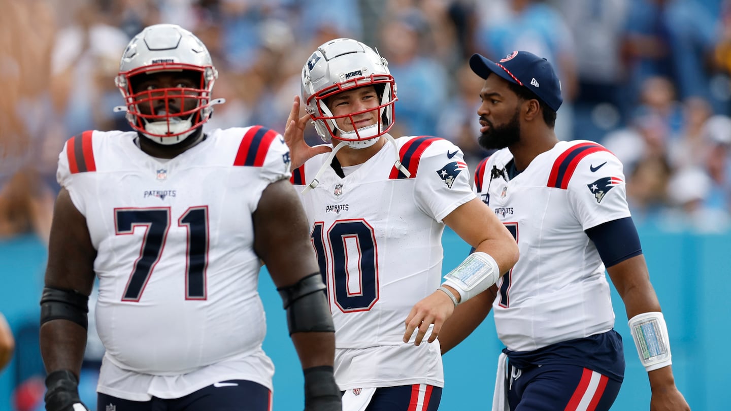 Patriots quarterback Drake Maye (center) lost a fumble and threw two interceptions — including one to end the game — as Patriots fell to the host Titans, 20-17, in overtime.