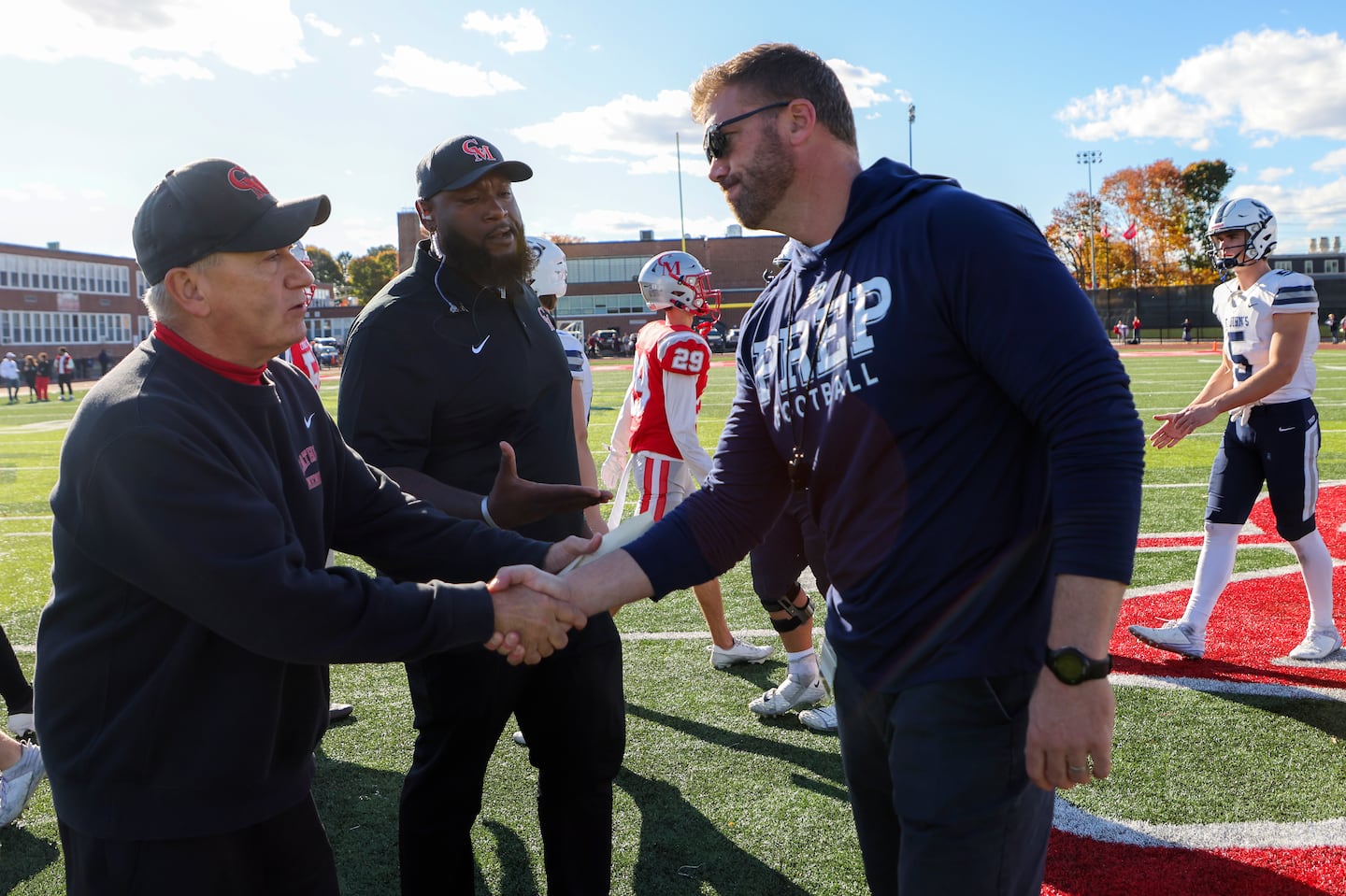 John DiBiaso (left) directed his Catholic Memorial squad to the No. 1 seed in Division 2, and Brian St. Pierre (right) and St. John's Prep earned the top seed in Division 1.