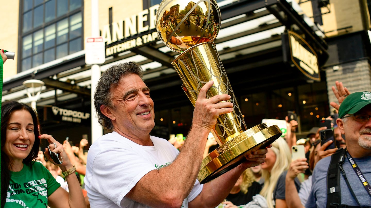 Owner Wyc Grousbeck of the Boston Celtics held the Larry O'Brien Championship Trophy during the 2024 Boston Celtics championship parade following their 2024 NBA Finals win on June 21 in Boston.