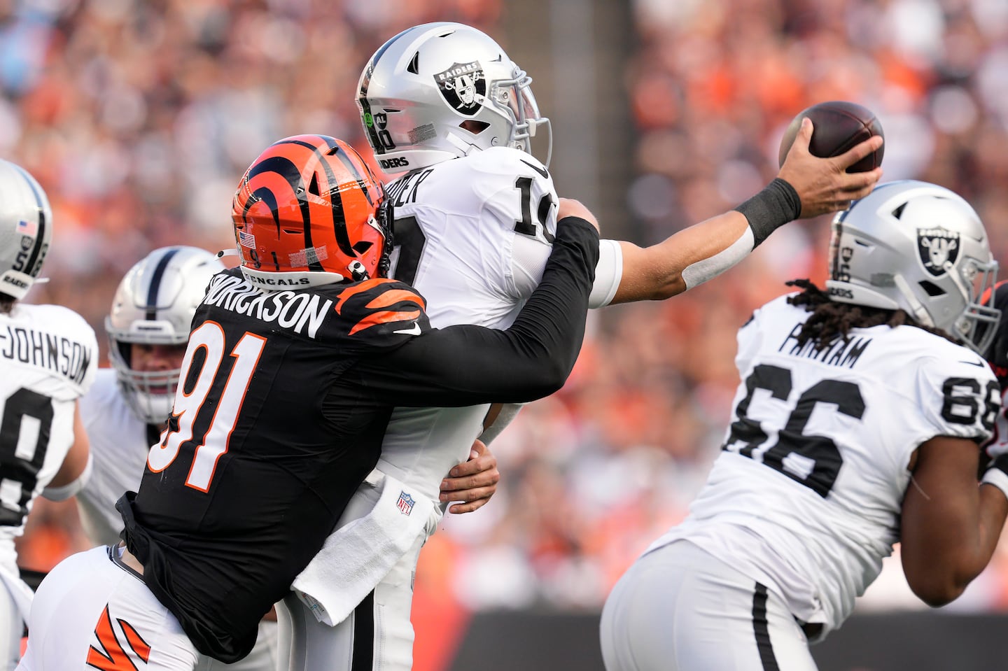 The Raiders' loss to the Bengals cost three assistant coaches their jobs.