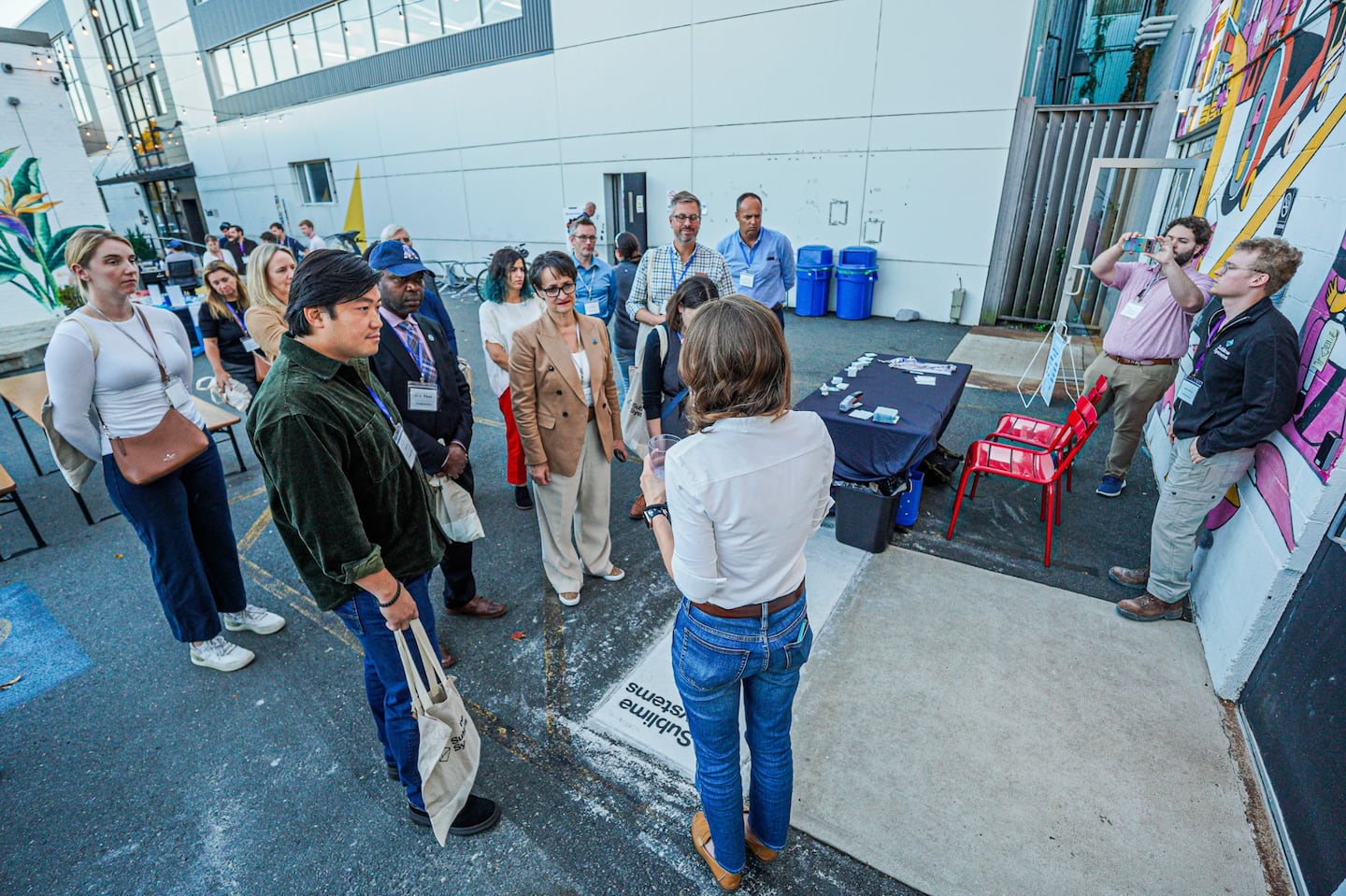 Startup Sublime Systems held a 'retirement party' on Oct. 21 for the most commonly used kind of cement, portland cement. Pictured in the center of this photo is Somerville Mayor Katjana Ballantyne.