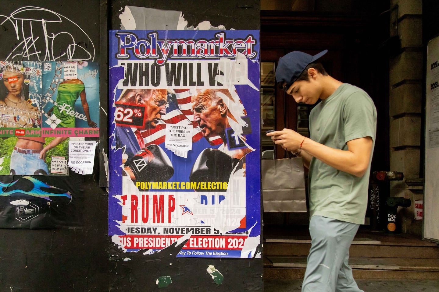 A man walked by a Polymarket advertisement in New York.