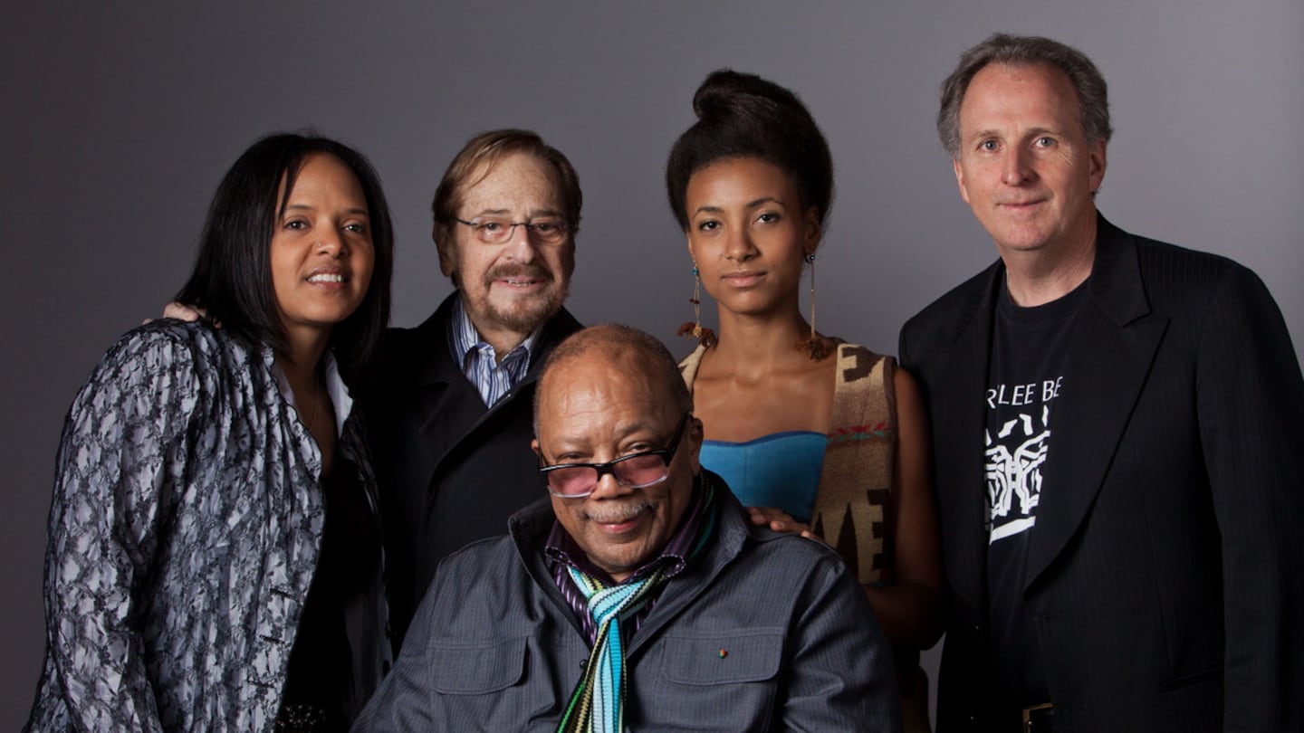 In 2014, Quincy Jones, center, attended a reception in Los Angeles for Berklee alumni nominated for Grammy Awards. Pictured with him from left are professor Terri Lyne Carrington, Berklee trustee Phil Ramone, Grammy winner Esperanza Spalding, and then-Berklee president Roger Brown.