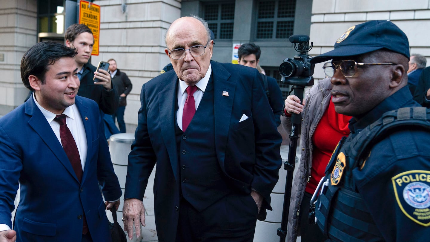 Rudy Giuliani leaves the federal courthouse in Washington, Dec. 15, 2023.