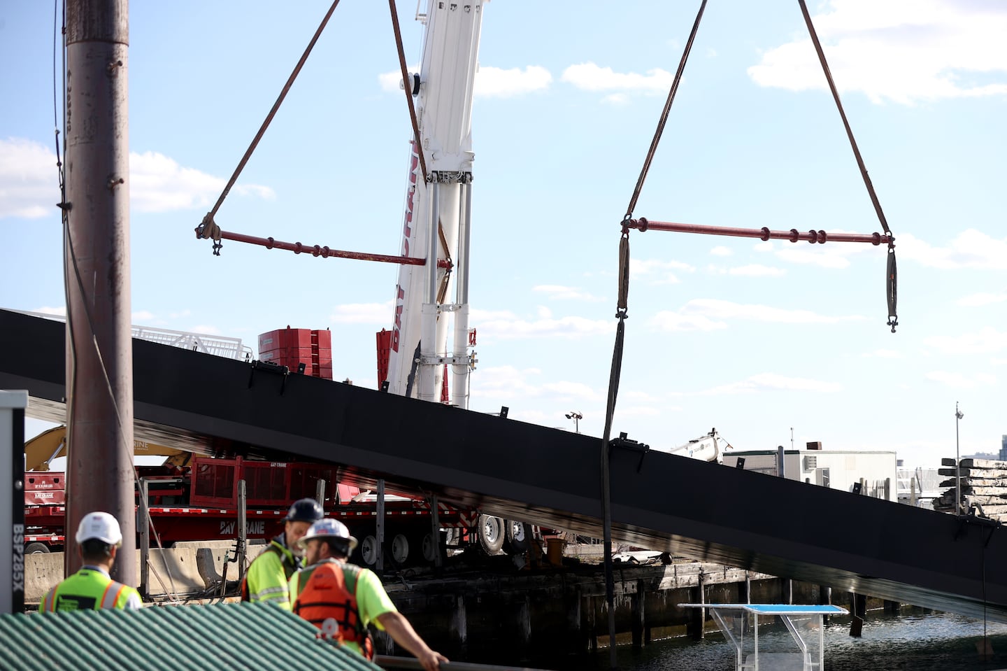 A mishap at the Boston Harbor Shipyard &Marina involving a crane working at the marina.